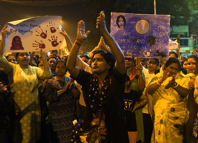 Women take part in 'Women: Re-claim the Night' vigil protest on the eve of Independence Day in Kolkata, West Bengal. 
 - Photo by Sandipan Chatterjee/Outlook